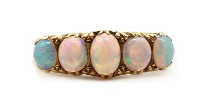 Lot 14 - An 18ct gold five stone opal ring