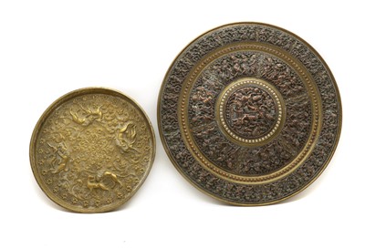 Lot 242 - A large Indian silvered copper and brass Thanjavour charger