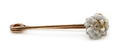 Lot 52 - A gold diamond and enamel flower