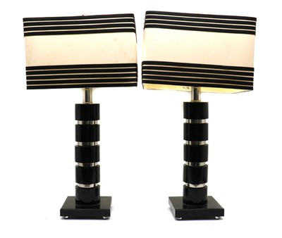 Lot 177 - A pair of 1970s black and chrome table lamps