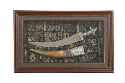 Lot 118 - A framed Bedouin jambiya and sheath