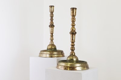 Lot 60 - Two gilt-brass candlesticks