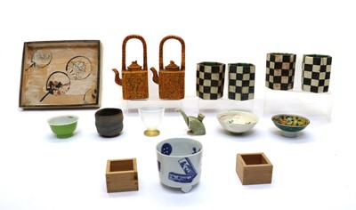 Lot 118 - Four Japanese pottery cups