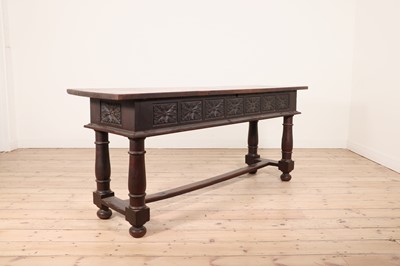 Lot 88 - A walnut centre table