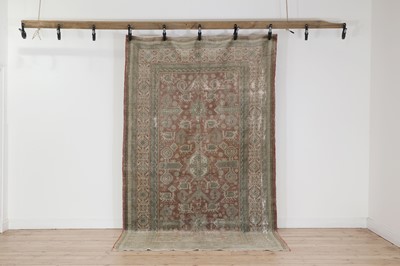 Lot 398 - A wool carpet of Caucasian design