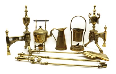 Lot 247 - A set of brass fire tools