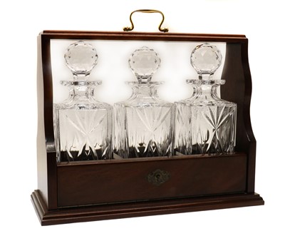 Lot 92 - A three-bottle tantalus