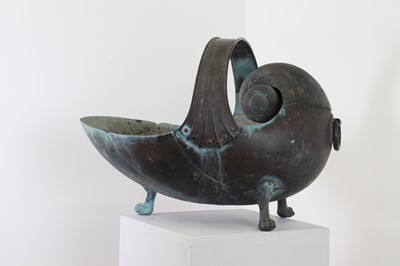 Lot 147 - A copper coal scuttle in the form of a nautilus shell