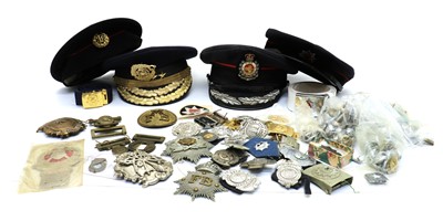 Lot 173 - A collection of four fire service caps