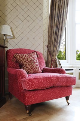 Lot 446 - A Howard style armchair