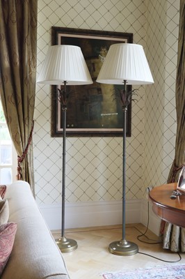Lot 438 - A pair of Jim Lawrence brass standard lamps