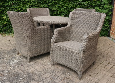 Lot 449 - A Bridgman Kensington rattan garden dining table