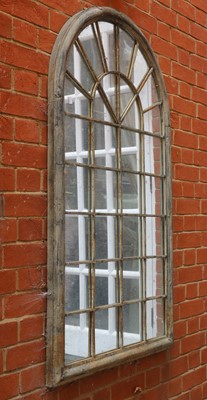 Lot 452 - A toleware bar glazed garden mirror