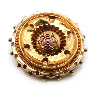 Lot 24 - A Victorian Etruscan Revival gold shield brooch