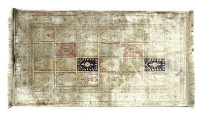 Lot 207 - A Hereke rug