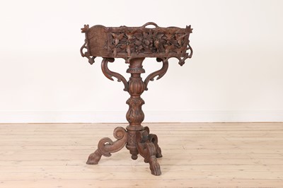 Lot 212 - A Black Forest carved softwood planter
