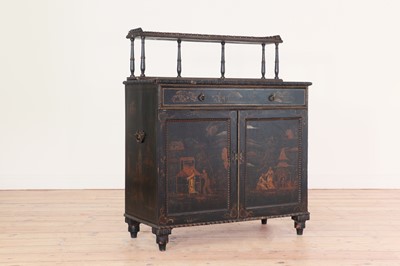 Lot 416 - A black-lacquered side cabinet