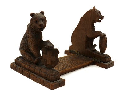 Lot 315 - A Black forest softwood book stand