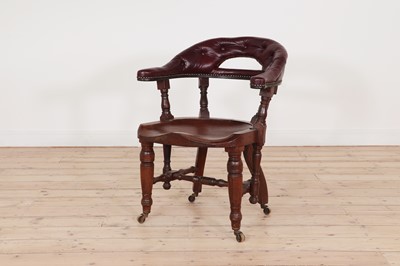 Lot 291 - A Victorian walnut and leather desk chair