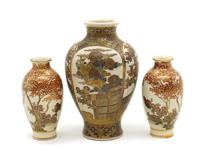 Lot 135 - A pair of Japanese Satsuma ware vases