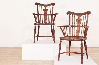 Lot 145 - A pair of Victorian mahogany Windsor armchairs, attributed to William Birch