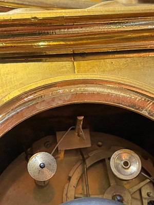 Lot 279 - An Empire ormolu clock