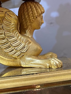 Lot 279 - An Empire ormolu clock
