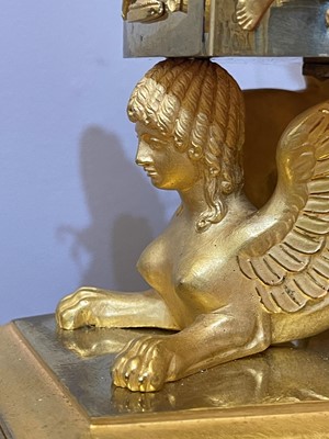 Lot 279 - An Empire ormolu clock