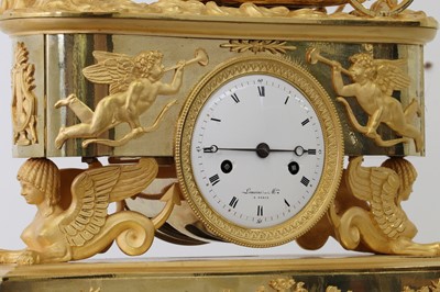 Lot 279 - An Empire ormolu clock