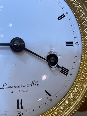Lot 279 - An Empire ormolu clock