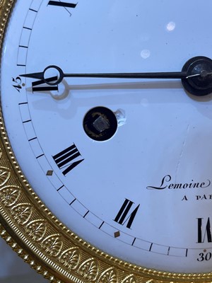 Lot 279 - An Empire ormolu clock