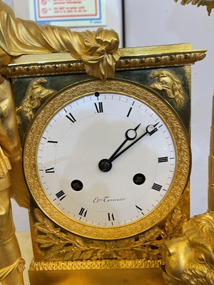 Lot 278 - A rare Empire ormolu mantel clock