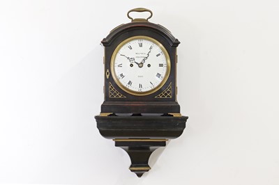 Lot 421 - A George III ebonised and brass-mounted bracket clock