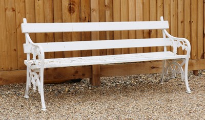 Lot 401 - A cast iron garden bench