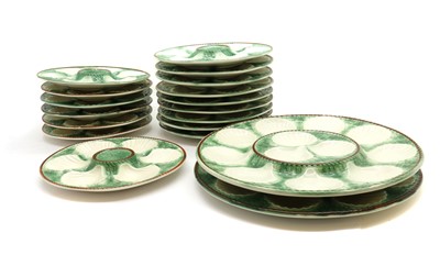 Lot 85 - A set of sixteen Longchamp majolica oyster plates