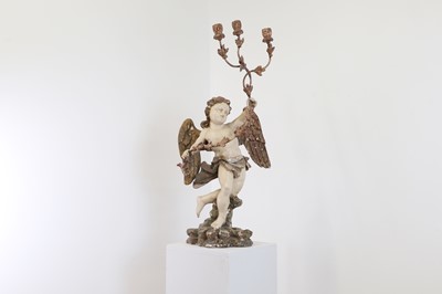Lot 396 - A carved and painted pine candelabrum