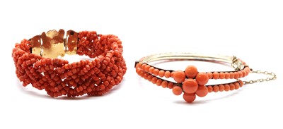 Lot 26 - A silver gilt coral bangle
