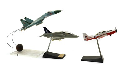 Lot 180 - Three model Military aircraft on display stands