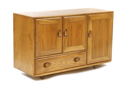 Lot 414 - An Ercol elm sideboard
