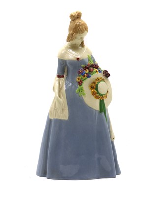 Lot 63 - An Austrian pottery figure of a lady