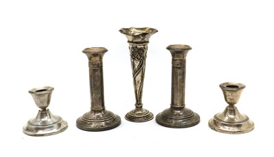 Lot 12 - A collection of silver candlesticks