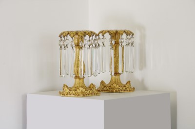 Lot 299 - A pair of porcelain candlesticks