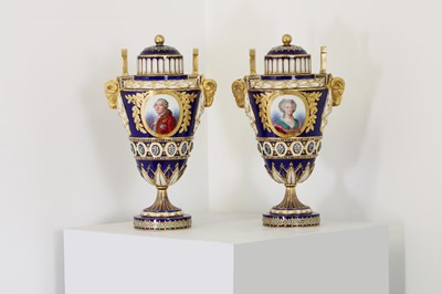 Lot 303 - A pair of Sèvres-style vases and covers
