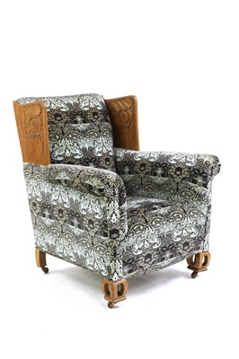 Lot 83 - An Arts and Crafts oak armchair