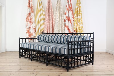 Lot 428 - An ebonised bamboo daybed