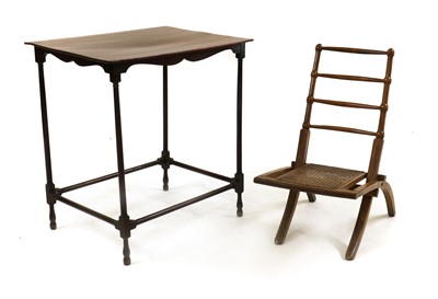 Lot 387 - A mahogany spider leg table