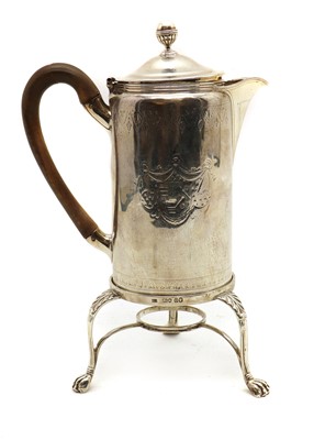 Lot 8 - A silver hot water pot and associated stand