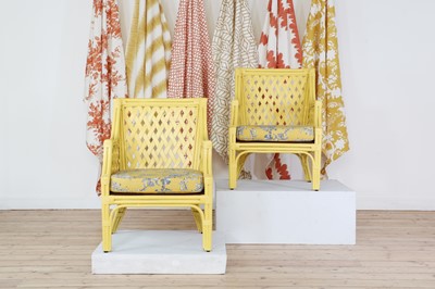Lot 439 - A pair of painted faux bamboo armchairs