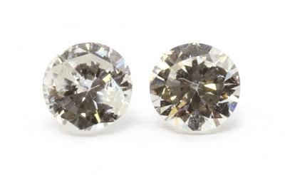Lot 63 - Two unmounted brilliant cut diamonds