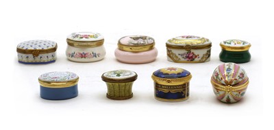 Lot 264 - A collection of enamel pillboxes